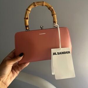 Pink leather Jil Sander bag with bamboo handle